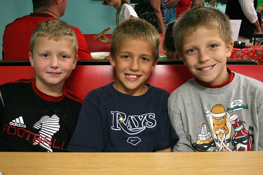 Matt Manning, Gavin Claussen and Jacob Claussen were excited to meet with Santa.