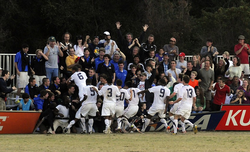 The U.S. Under-17 Menâ€™s National Team celebrates with fans after taking a 2-1 lead in the first half.