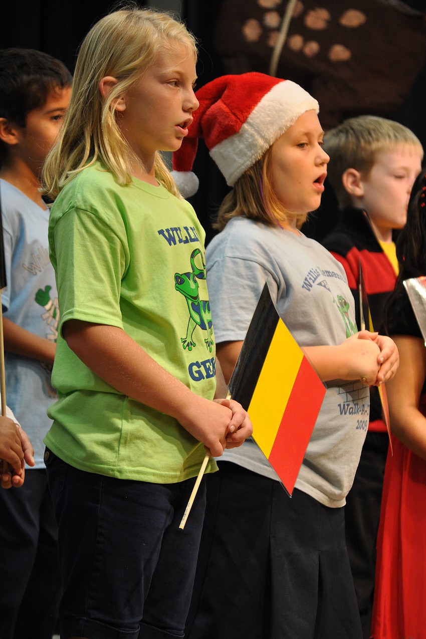 Savannah Barron, left, and her classmates sang 