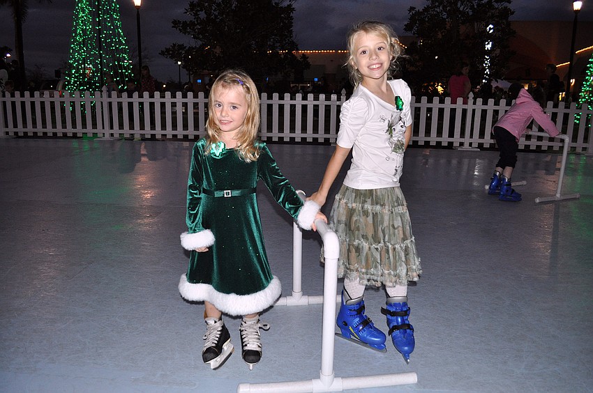 Four-year-old Gabrielle Elliott and her older sister Emerson, 7, were one two of the first children out on the ice.