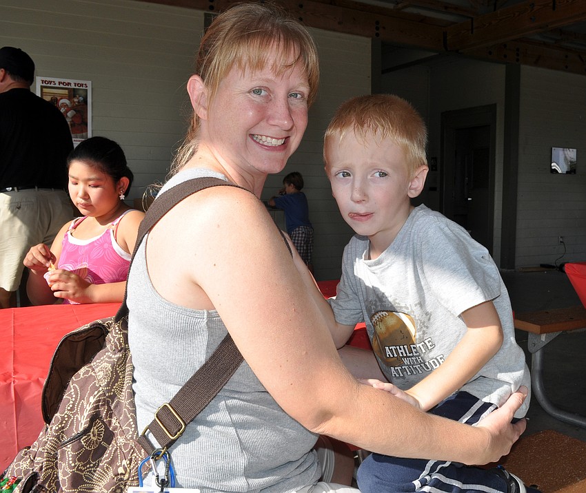 Palmetto residents Erin Prosman and her son Trevor, 5, heard about the event through Woodland, The Community Church.