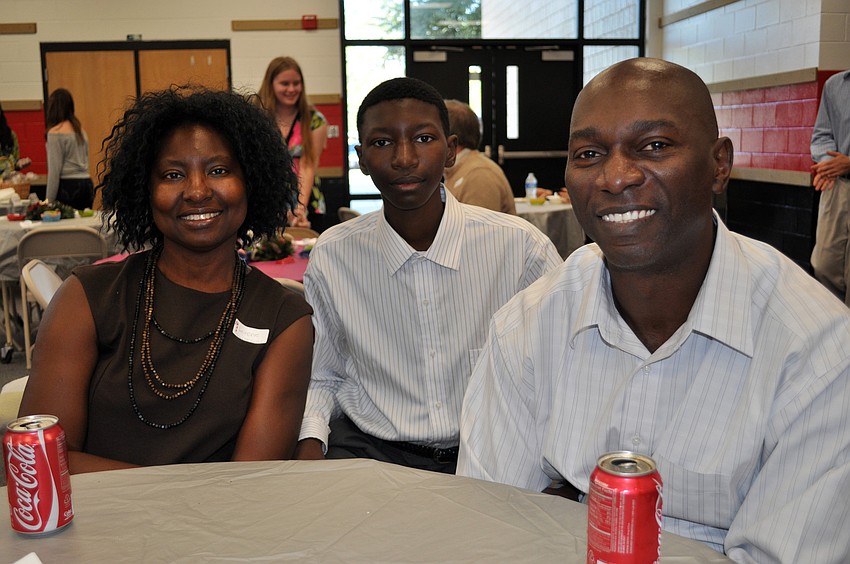 Lorene and Vincent Kwapong came out to support their son Ato, center.