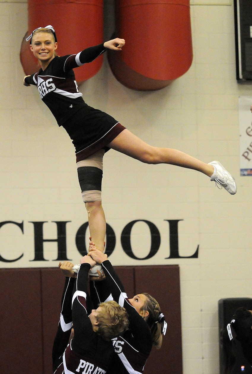 Junior Caytie Chrisman performed a series of stunts for Braden Riverâ€™s varsity squad.
