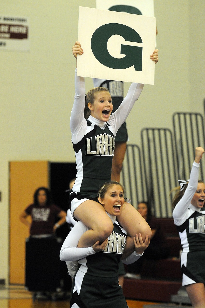 Sophomore Amy Jo Lawson, bottom, and freshman Taylor Shilling kept the crowd energized.
