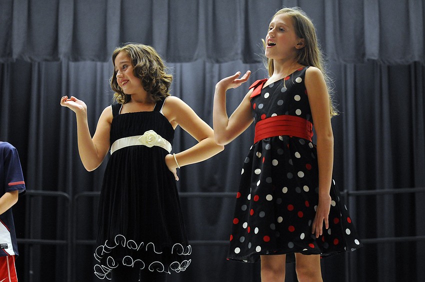 Ten-year-old Audrey Lipton, left, played the role of a movie star doll while her twin sister Abby was a Barbie doll.