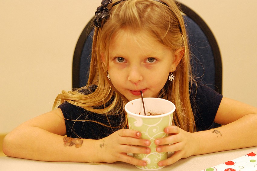 Kaitlyn Danowski took time to enjoy her hot chocolate