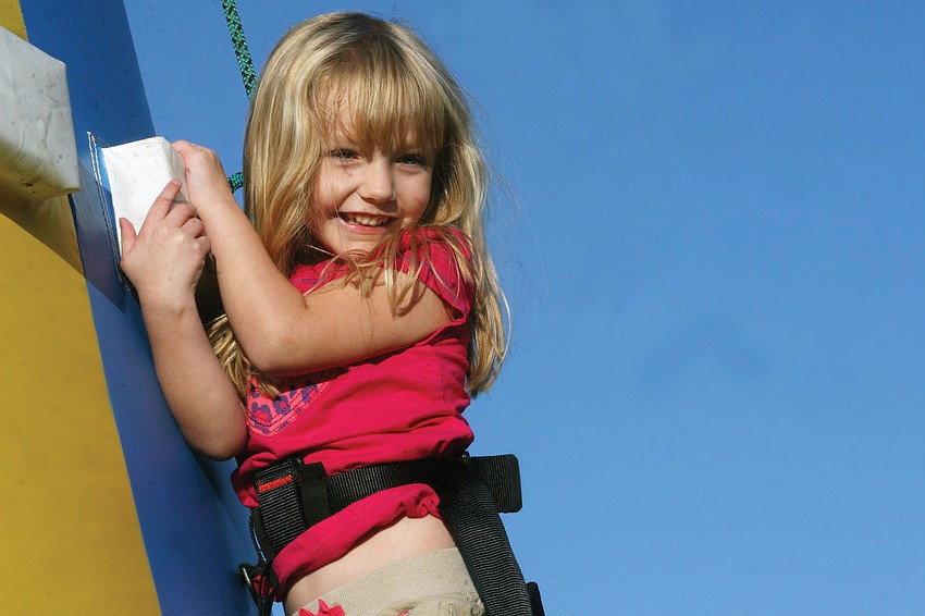 Danielle Richter, 3, braved the inflatable climbing course at the second Mark Wandall Foundation Family Fun Night Nov. 4. Published Nov. 10, 2011.
