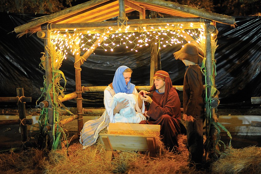 Hunter Brown, 16, and Rachel Gross, 15, played the roles of Joseph and Mary, while 8-year-old Jacob Seminick played the role of a shepherd boy, at Living Lord Lutheran Church's 
