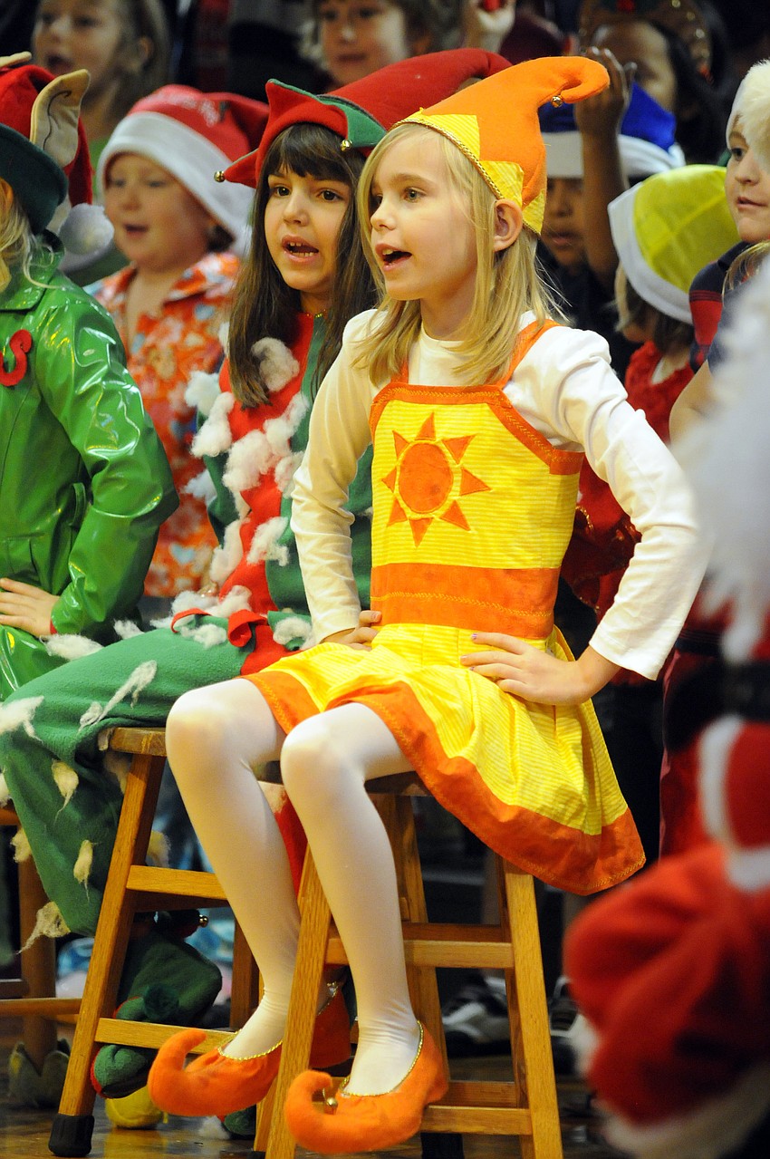 Windy elf, Victoria Kelley, left, and sunny elf, Iris Taverney, enjoyed performing in this yearâ€™s Christmas musical.