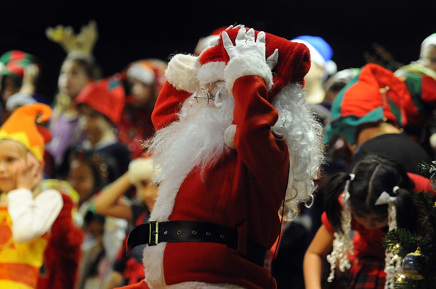 Santa Claus, played by Aidan Hebert, reacts to the news that an asteroid is headed for the North Pole.
