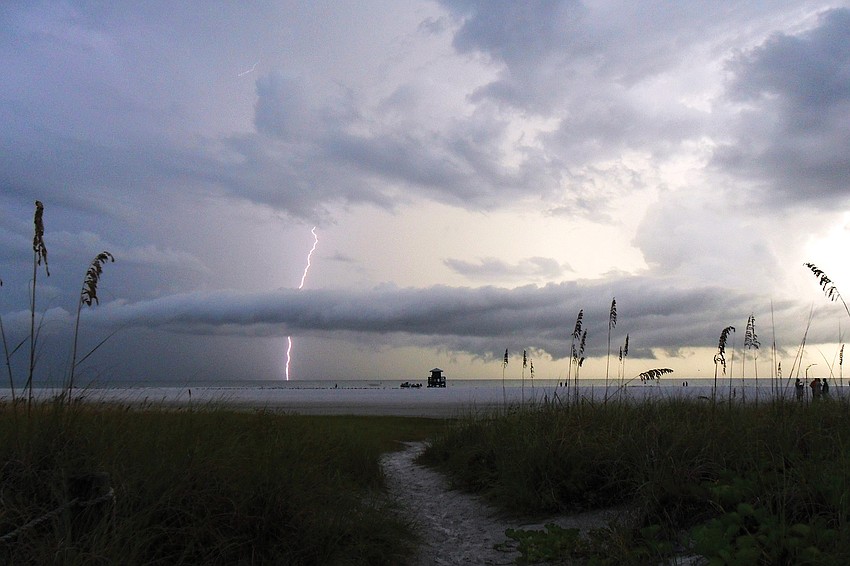 Stroke of Luck: Palm-Aire resident Scott Brantley's shockingly fast fingers caught this image off of Siesta Key a late-January thunderstorm.