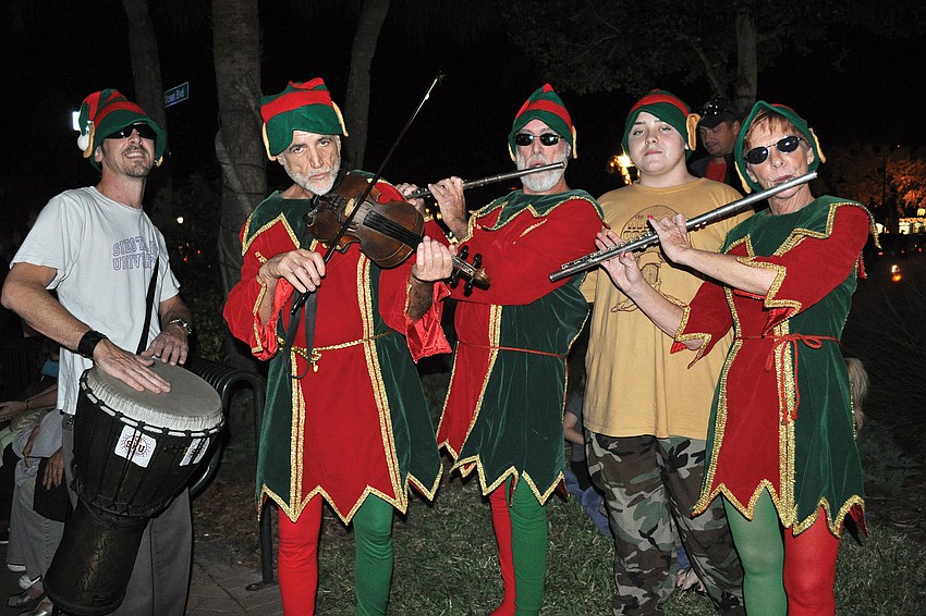 Berry Oakley, Richard Leps, Richard Burton, Shaun Oakley and Kat Rothen helped kick off the Keyâ€™s holiday season during Light Up the Village.