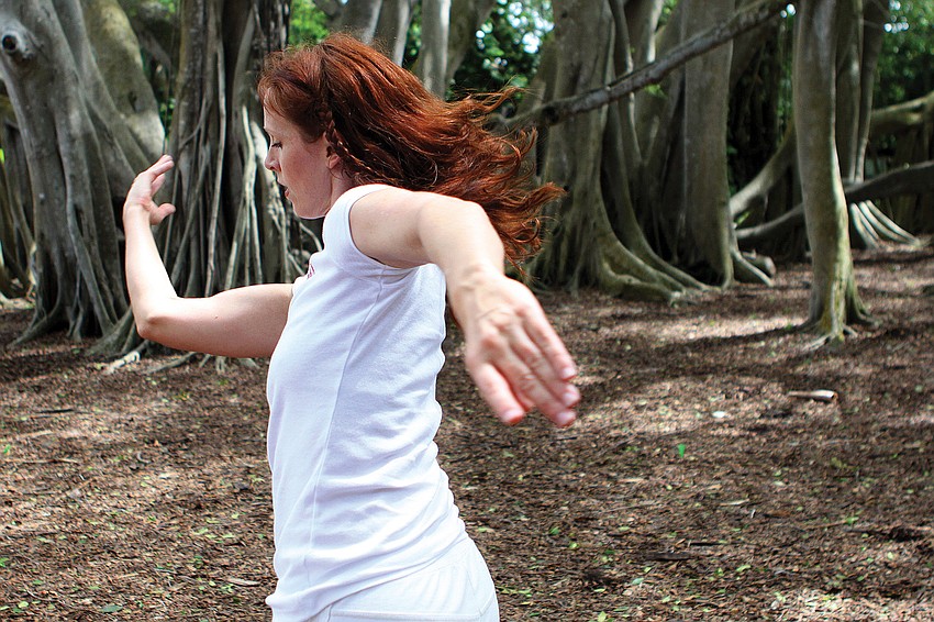 Amy Hassler performed under the banyan trees in October at GartenFest.