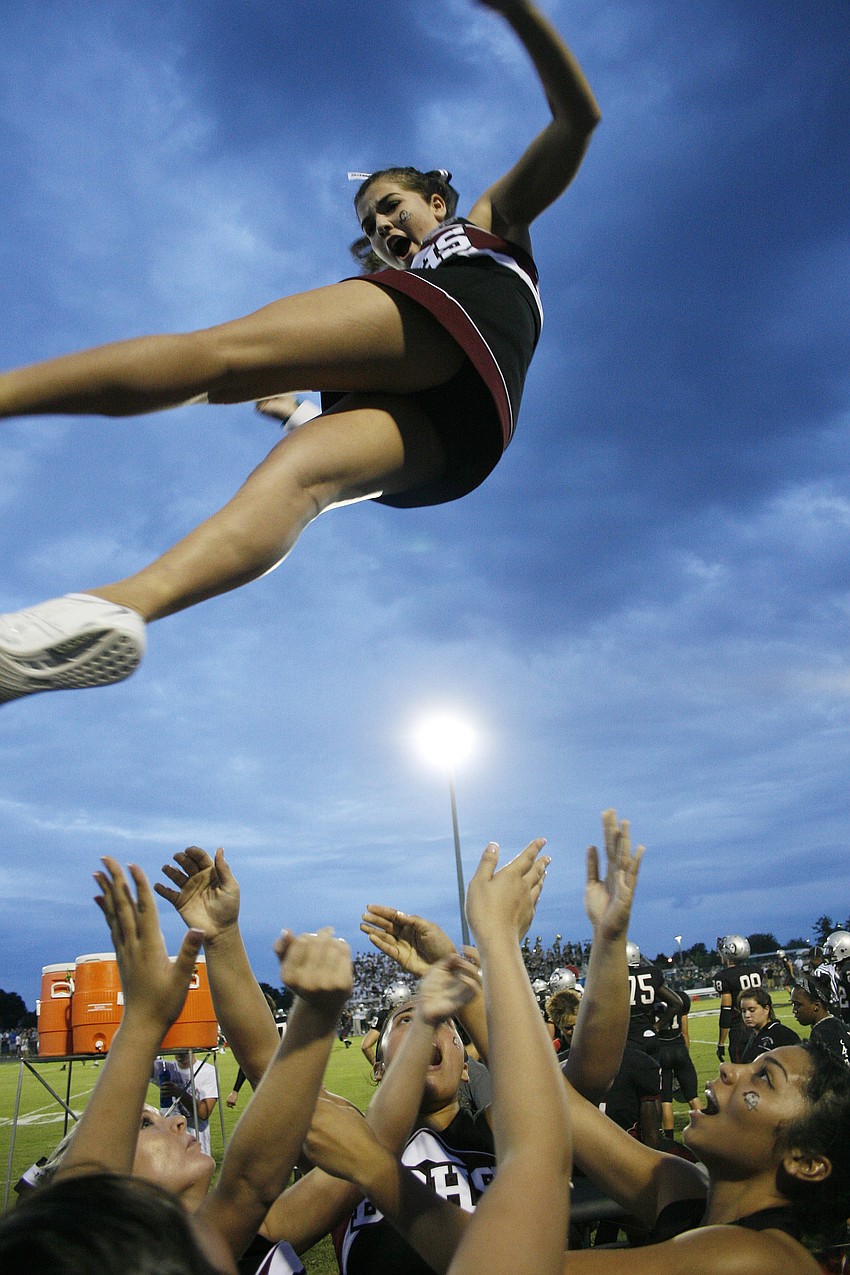 Allison Malcom is one of the flyers on the Pirate cheerleading squad.