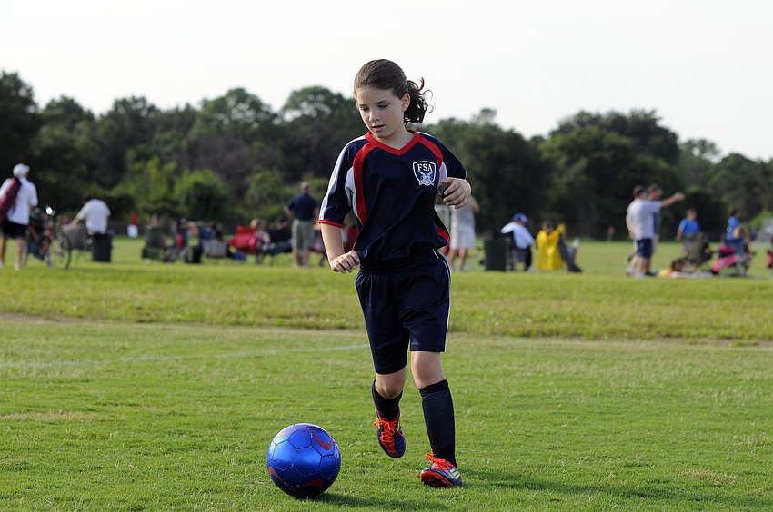 Nine-year-old Lindsey Vilece plays goalie for FSA Freedomâ€™s U10 girls team.