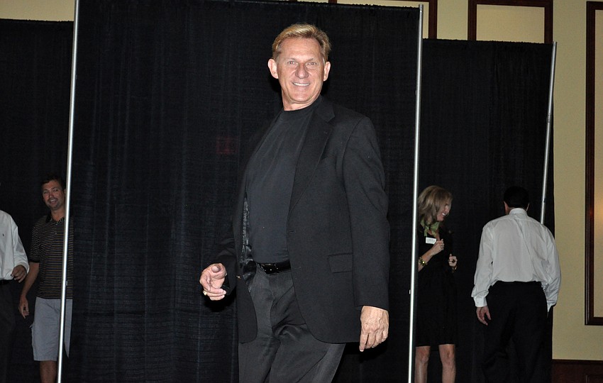 Peter Salefsky of Michael Saunders has previously modeled in the fashion show.