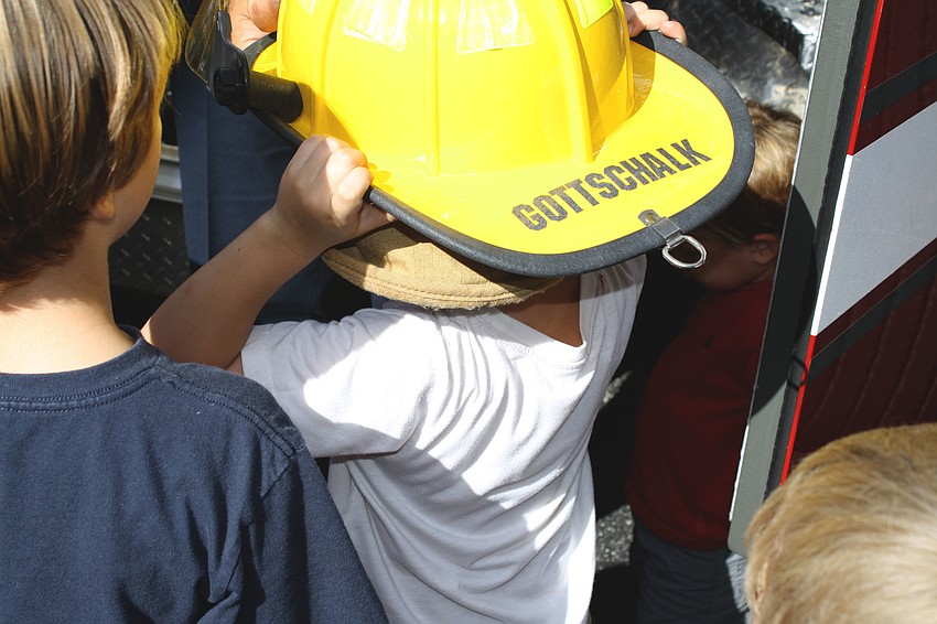 The 27 children of St. Boniface preschool learn what itâ€™s like to be a fireman; itâ€™s a big hat to fill!