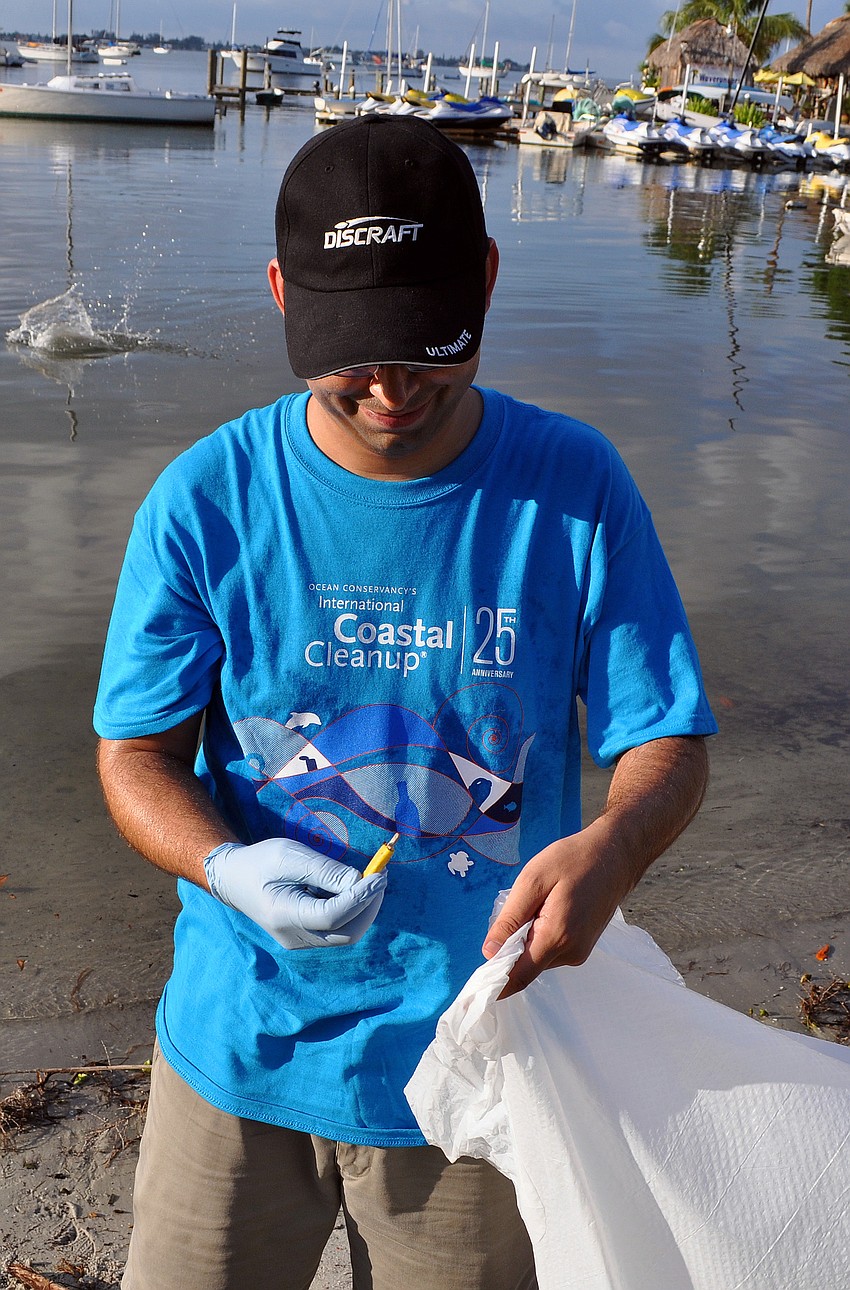 Krishen Greenwell found a cigarette lighter along the shore during the International Coastal Cleanup.