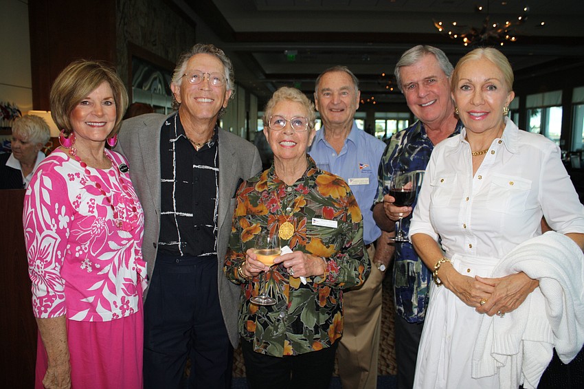 Patty and Bill Bruner, Gerry Beryton, Monique Breyton, John and Michele Powell pose for a photo.