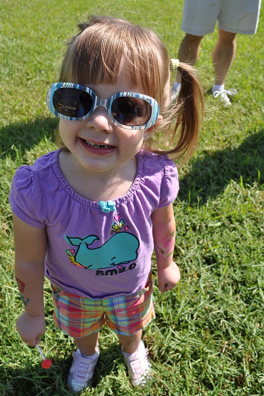 Liz Bentze, 2, came out with her parents and her brother.