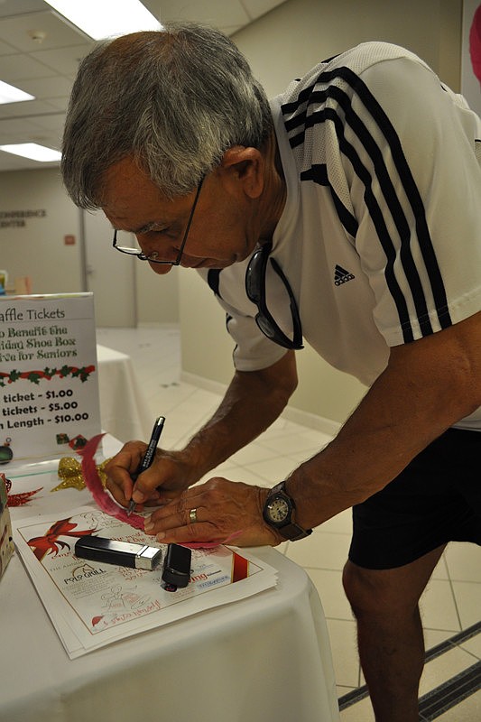 Bill Plerhoples filled out a raffle ticket.