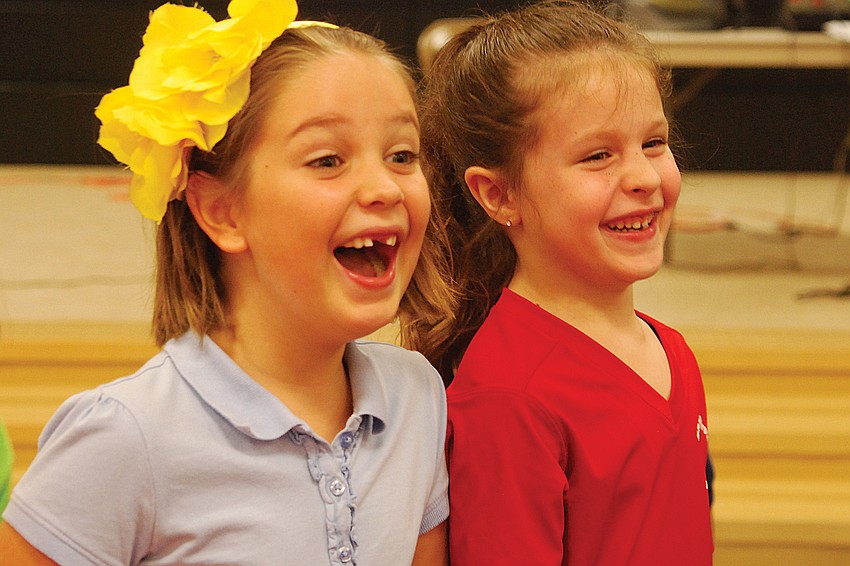 Second graders Zoe Polivchak and Haley Dragon couldnâ€™t stop smiling.