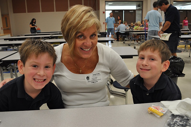 Jayne Clark enjoyed lunch with her twin grandsons, Kyle, left, and Kaleb, right.
