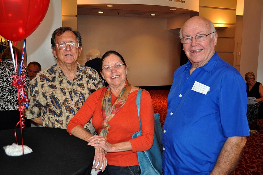 Tony and Geni Mansell pose with Robert VanSkike