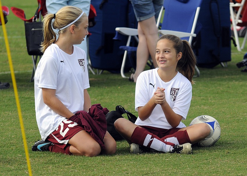 Sixth-graders Sydney Wicks and Ally Boudreau both play on Braden Riverâ€™s U12 team, which won the Halloween Havoc.