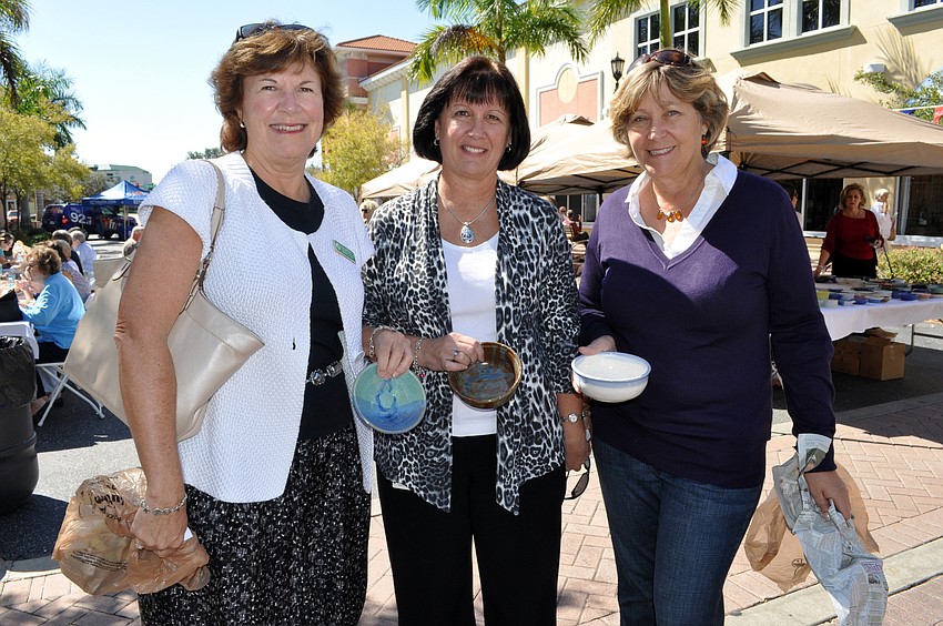 Sue Stewart, Rae Dowling and Betsy Benac couldnâ€™t wait to sample the many different types of soup.