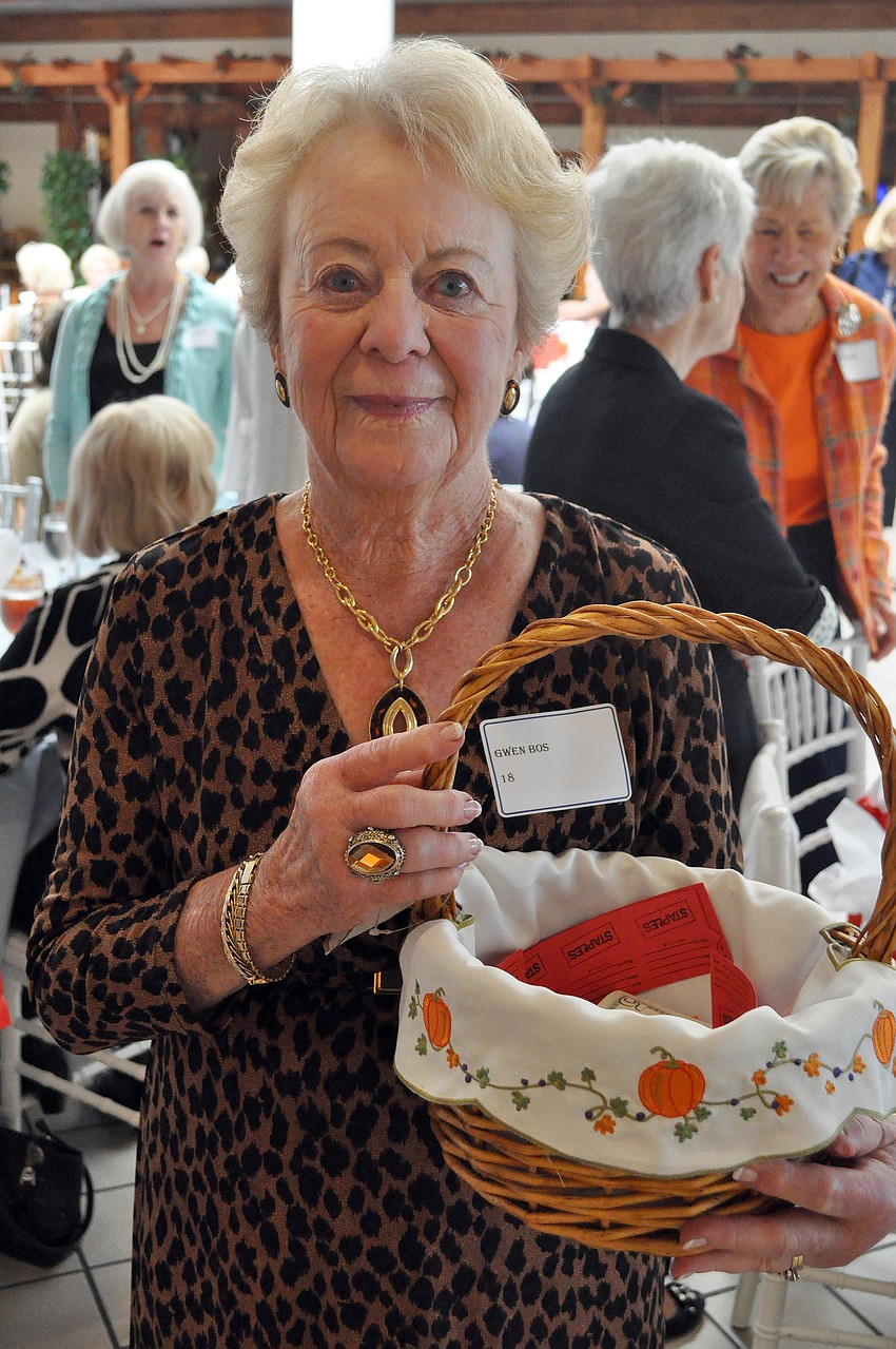 Gwen Bos went around to all the tables selling raffle tickets.