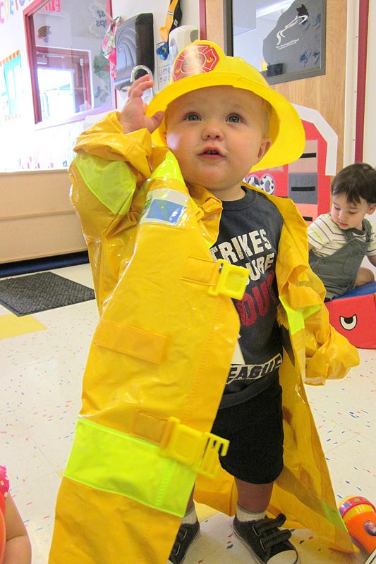 Gabe White tried on a firefighter outfit.