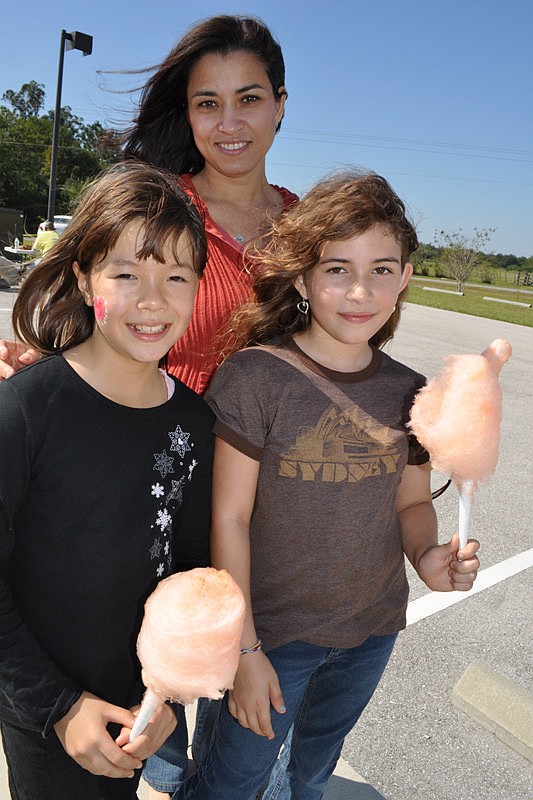 Mica Kondl-Chahlos made friends with Adina Mayo, right, and her mother, Yahdinah Alvarez, center.