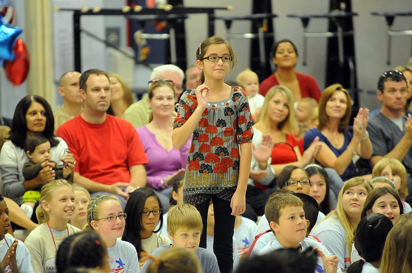 Fifth-grader Emily Benedicto was recognized as the winner of the First Responders flag contest.
