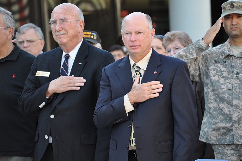 Manatee County Commissioner Larry Bustle and Schools Superintendent Tim McGonegal said the Pledge of Allegiance.