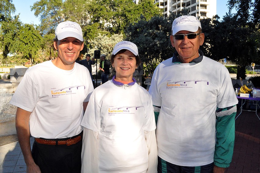 Rick Thie poses with his PC Striders teammates, Barbara and Klaus Lang