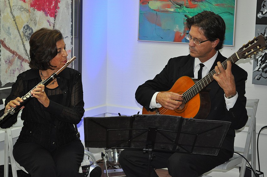 Music teachers from the State College of Florida Jane Hoffman and Rex Willis provided musical entertainment