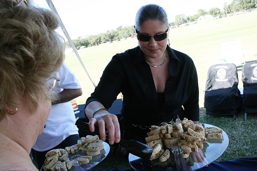 Toni Barion offered a variety of tastes at her booth for Millie's Gourmet Biscotti.