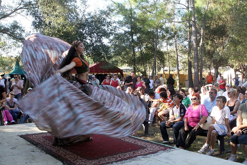 Angela Hicks, of Tribal Fusion Bellydance, dances on the Tower Stage, Sunday, Nov. 13, at the Sarasota Medieval Fair.