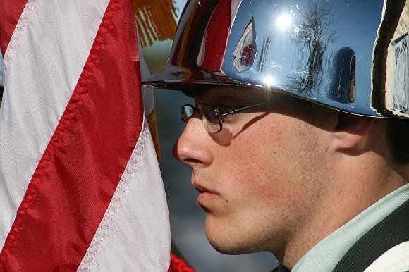 Lakewood Ranch JROTC's Joel Balfour carried the American flag. Photo by Mike Eng.