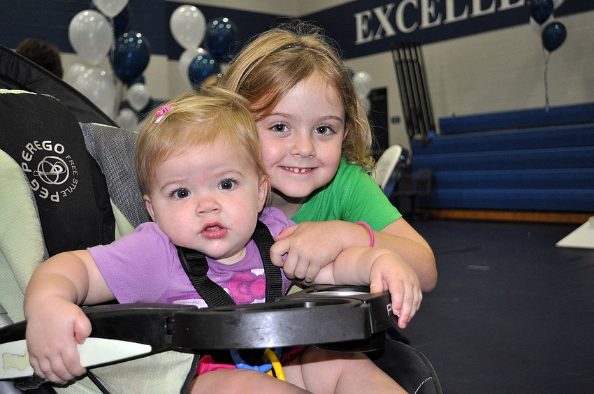 Five-year-old Eva Dyer, pictured with her 11-month-old sister Ella, couldnâ€™t wait to play all of the games.