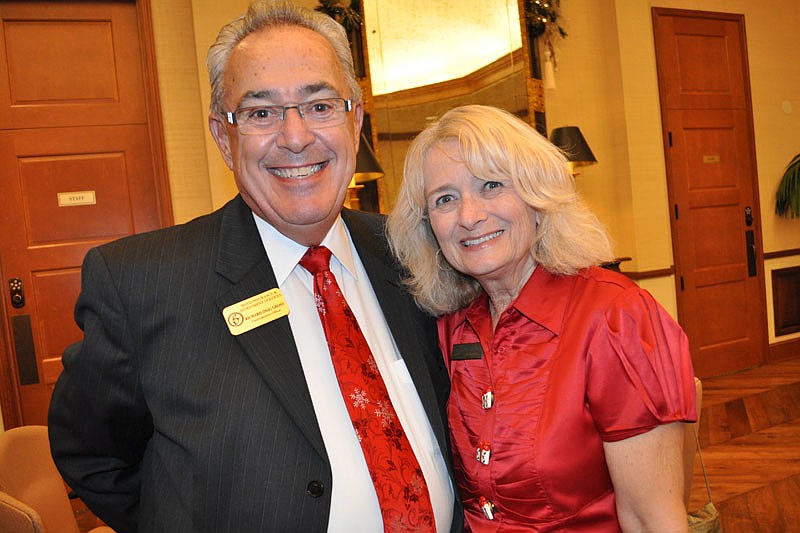 Dick Gross of Boyd Insurance & Investment Services and Pam Kalaczynski of Wingate Hotel
