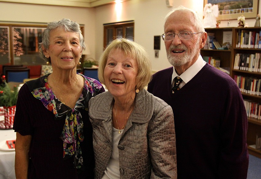 Jean White poses in between Jane and Cal Boehme during Longboat Key Garden Clubâ€™s Candy Cane Lane holiday party, Thursday, Dec. 8 at All Angels by the Sea.