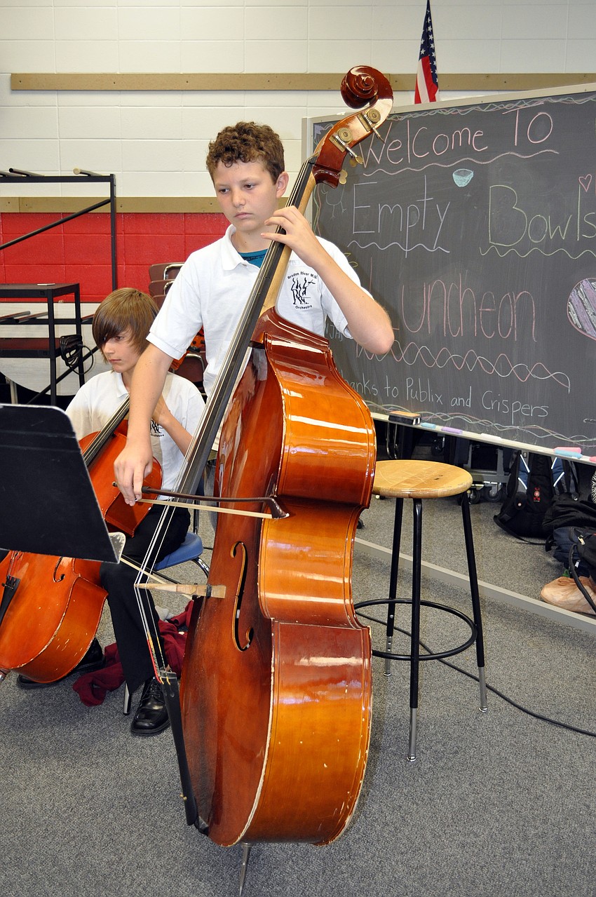 Thirteen-year-old Daniel Jones performed for guests with other members of Braden River Middleâ€™s orchestra.