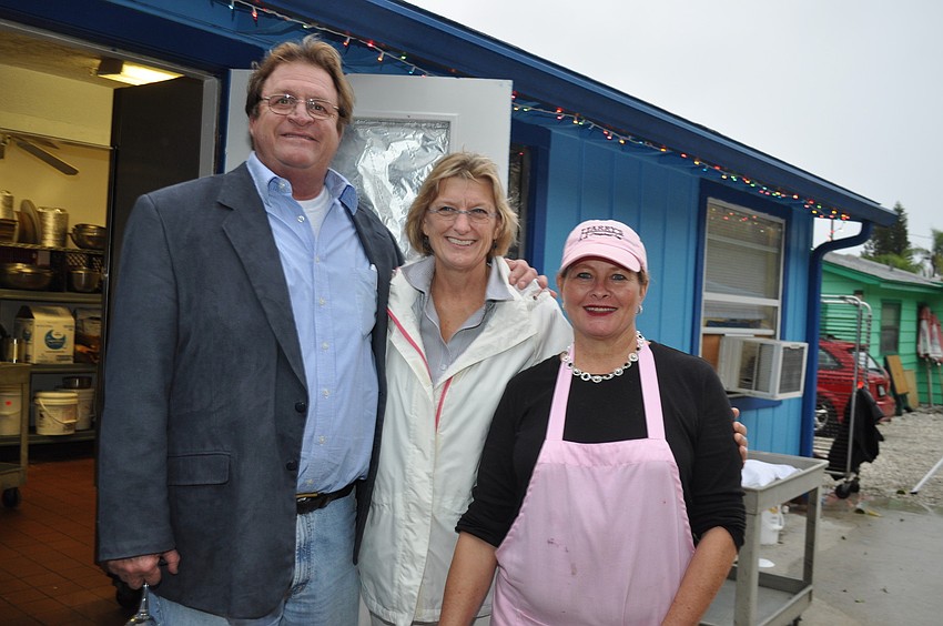 Owners Harry and Lynn Christensen with Kim Hoatland