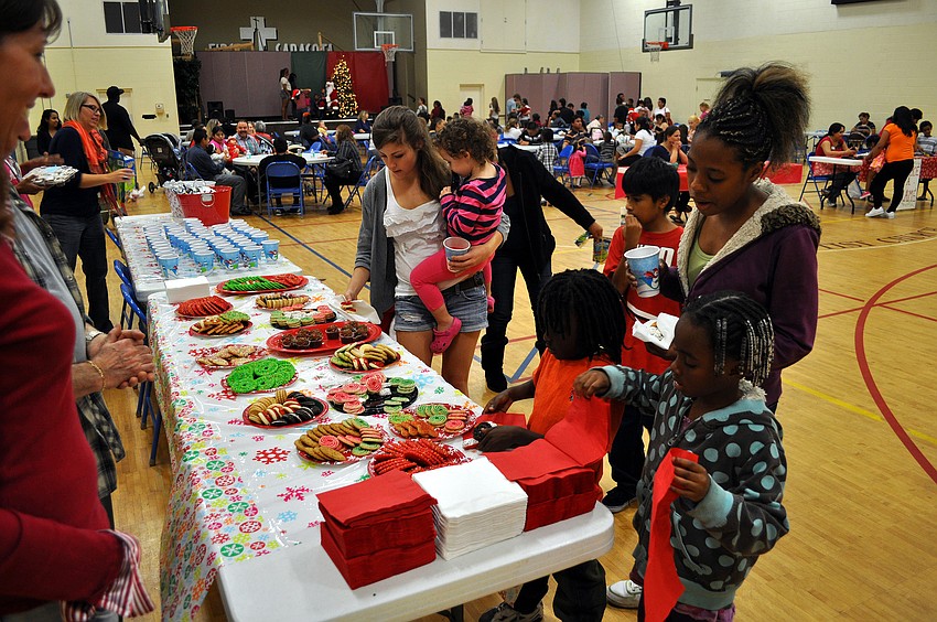 Healthy Families Sarasota put out juice and holiday cookies for people to snack on while at the party.