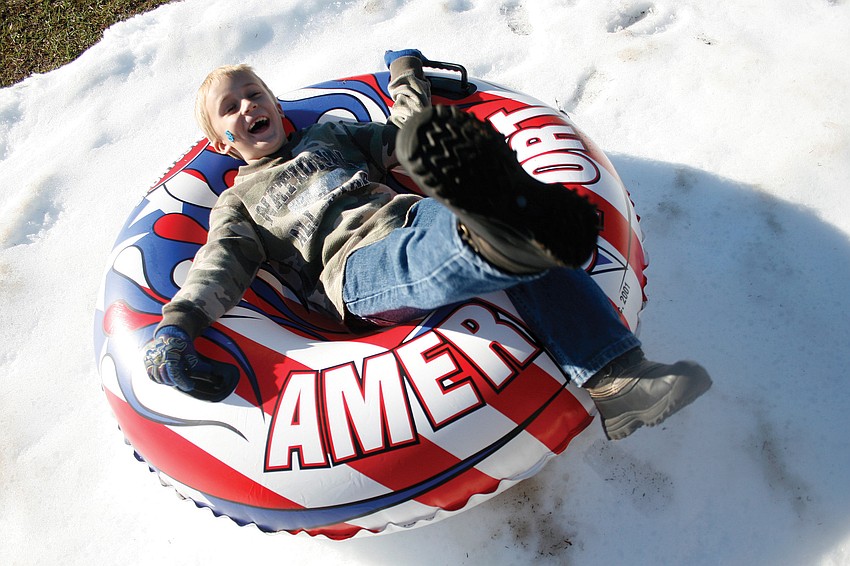 John-Thomas Duff, 7, spun in circles all the way down the snow-covered hill during Tabernacle Christian School's snow day event. Published Feb. 3, 2011.