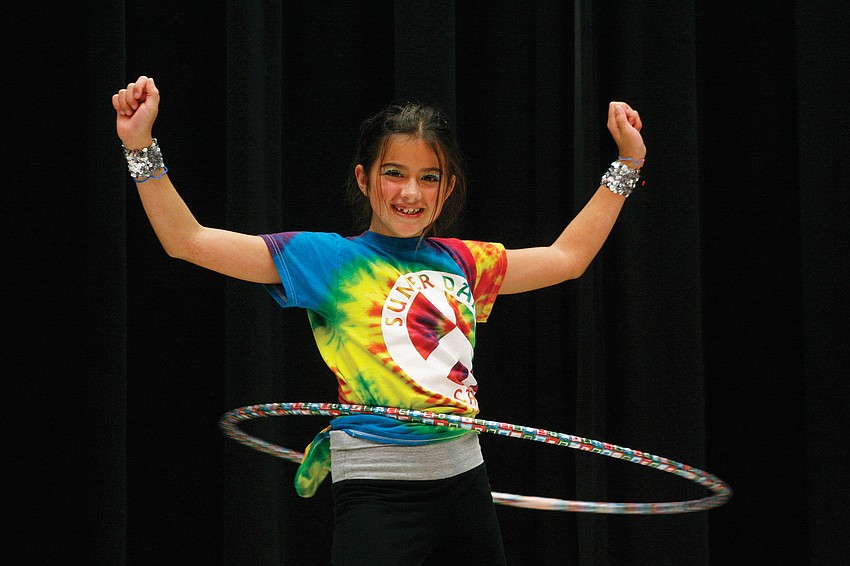 Savana Meyer kept her hula hoop spinning with ease during the Summer Dance Camp Recital July 15 at Gullett Elementary School. Published July 28, 2011.