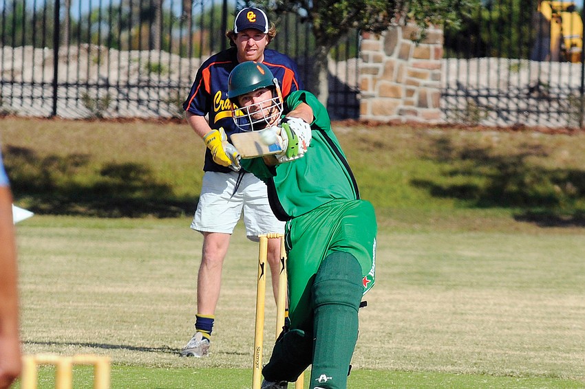 Richard Barker, of the Cayman Islands, scored six runs in a single shot during the Sarasota International Cricket Club for the 2011 Sarasota Six-A-Side Festival. Published Dec. 1, 2011.