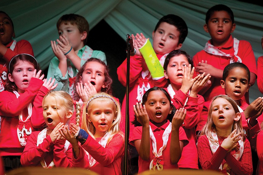 Students at Braden River Elementary School spread holiday cheer with a special performance Dec. 8 during the schoolâ€™s Supper with Santa. Courtesy of Robert Pope of Robert Pope Photography. Published Dec. 15, 2011.